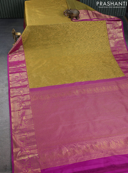 Kanchipuram silk saree mehendi green and pink with allover zari woven brocade weaves and zari woven border