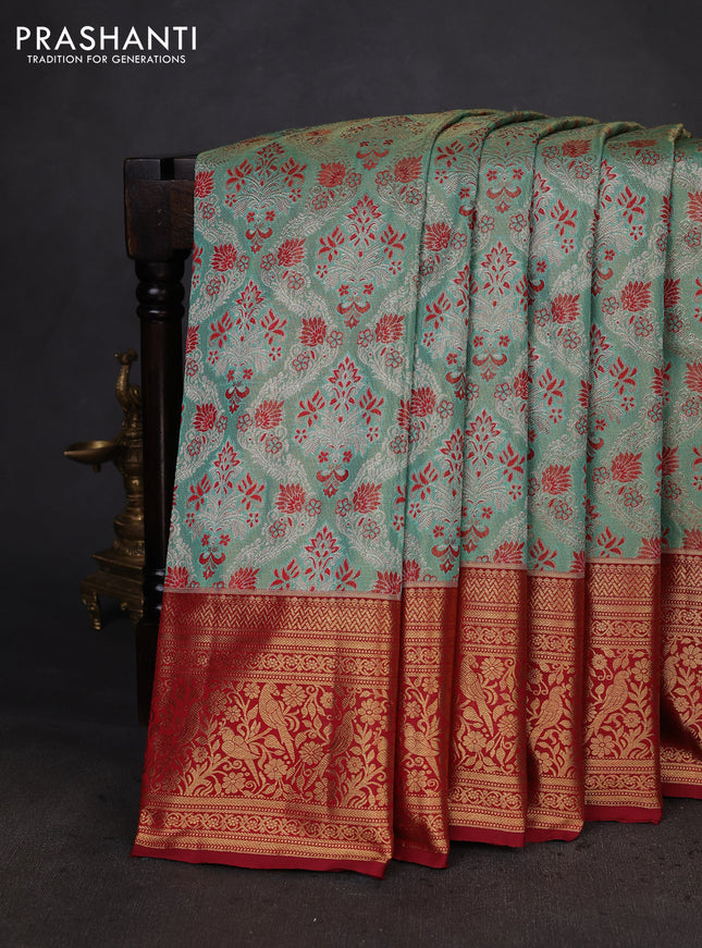 Kanchipuram tissue silk saree teal gren and maroon with allover zari woven brocade weaves and zari woven border