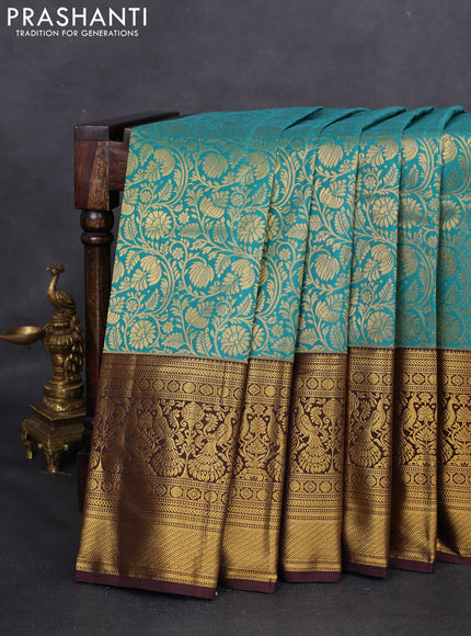 Kanchipuram silk saree teal green and coffee brown with allover zari woven brocade weaves and long zari woven border