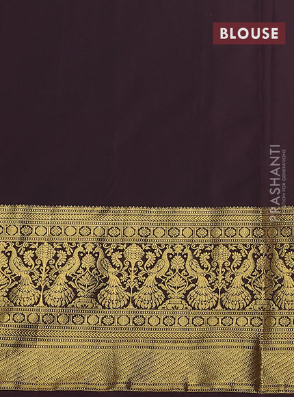 Kanchipuram silk saree teal green and coffee brown with allover zari woven brocade weaves and long zari woven border
