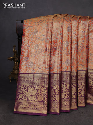 Kanchipuram tissue silk saree orange and deep purple with allover zari woven brocade weaves and long zari woven border