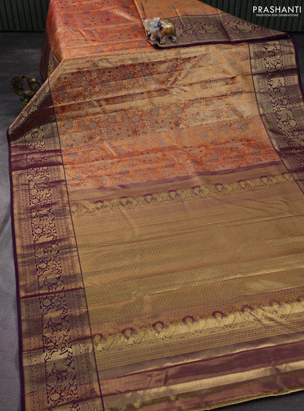 Kanchipuram tissue silk saree orange and deep purple with allover zari woven brocade weaves and long zari woven border