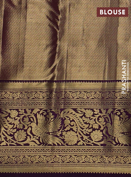 Kanchipuram tissue silk saree orange and deep purple with allover zari woven brocade weaves and long zari woven border
