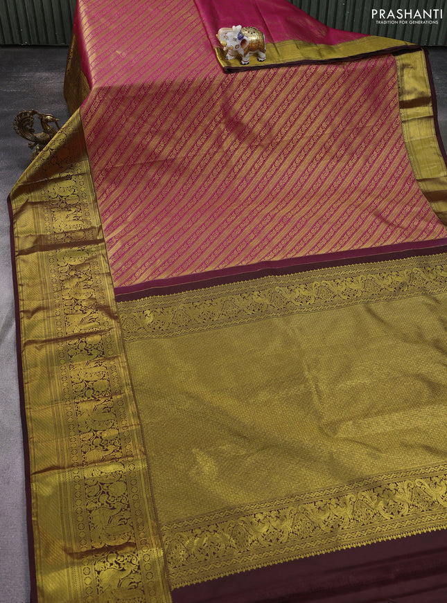 Kanchipuram silk saree pink and coffee brown with allover zari woven brocade weaves and long zari woven border
