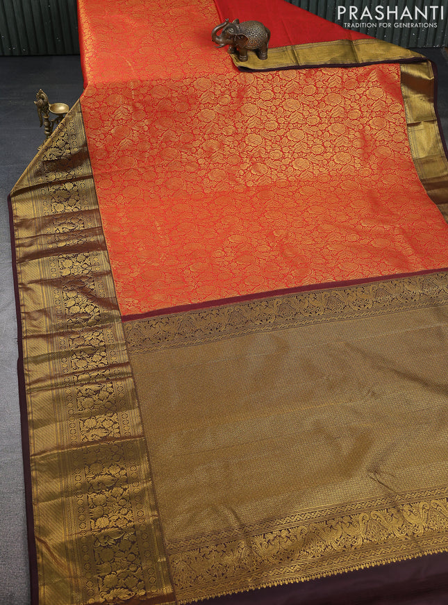 Kanchipuram silk saree red and coffee brown with allover zari woven brocade weaves and long zari woven border