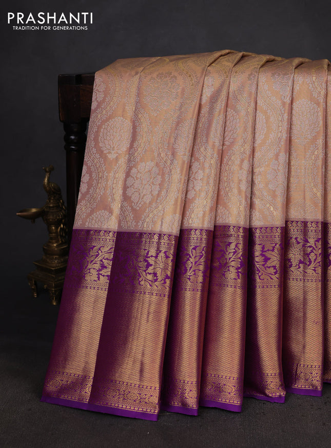 Kanchipuram tissue silk saree pastel pink and purple with allover zari woven brocade weaves and long zari woven border