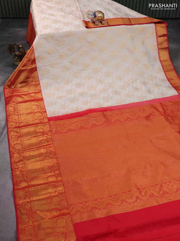 Kanchipuram silk saree off white and red with allover zari woven brocade weaves and long zari woven border