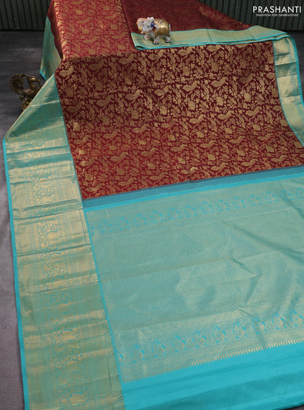 Kanchipuram silk saree maroon and pastel blue with allover zari woven brocade weaves and long zari woven border
