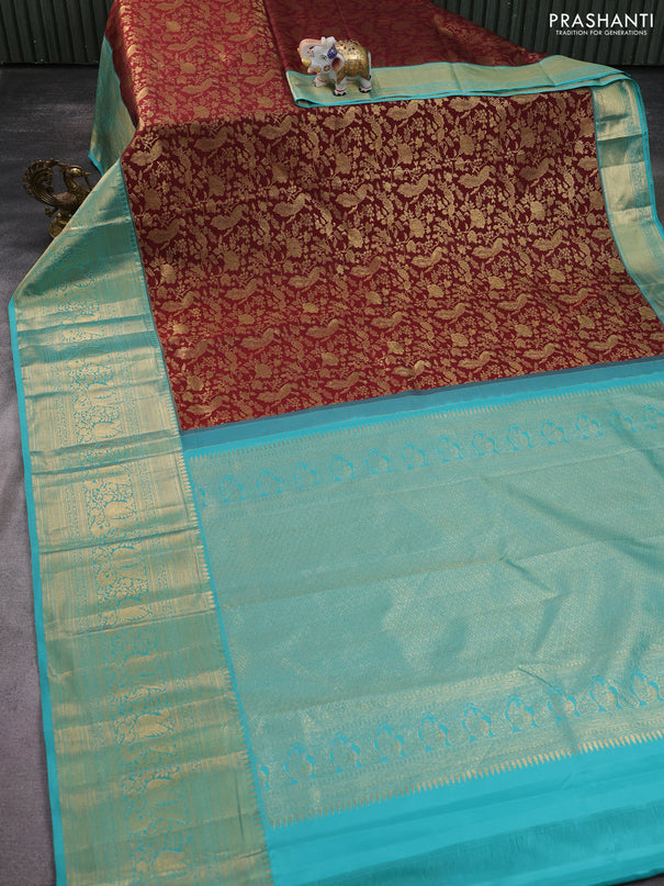 Kanchipuram silk saree maroon and pastel blue with allover zari woven brocade weaves and long zari woven border
