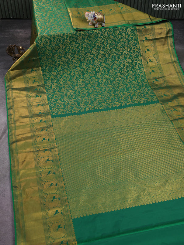 Kanchipuram silk saree green with allover zari woven brocade weaves and long zari woven border