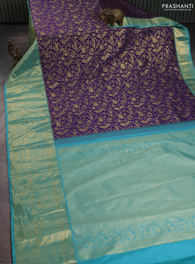 Kanchipuram silk saree violet and teal blue with allover zari woven brocade weaves and long zari woven border