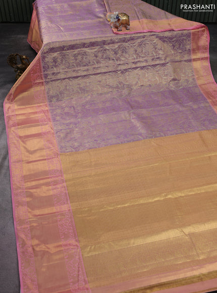 Kanchipuram tissue silk saree pastel lavender and peach pink with allover zari woven brocade weaves and long zari woven border
