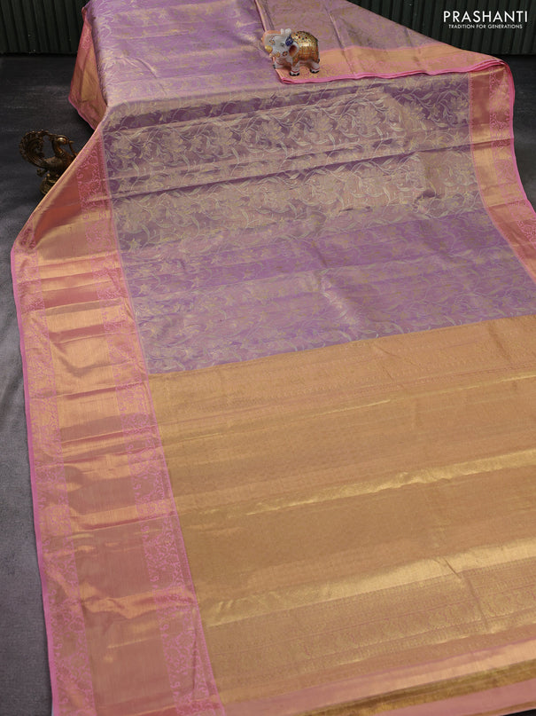 Kanchipuram tissue silk saree pastel lavender and peach pink with allover zari woven brocade weaves and long zari woven border