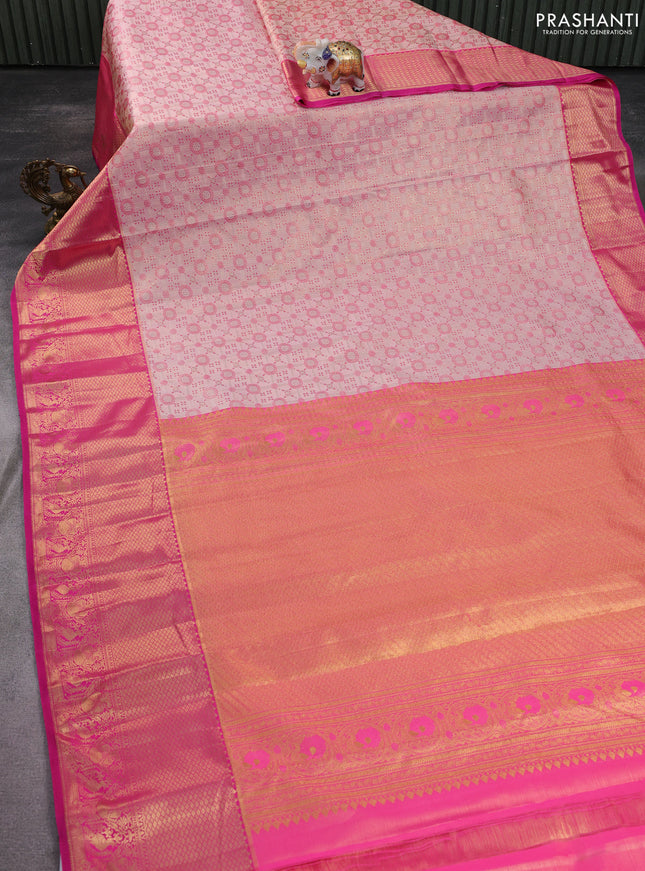 Kanchipuram tissue silk saree baby pink and pink with allover zari woven brocade weaves and zari woven border