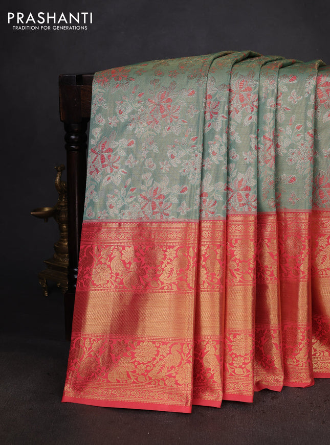Kanchipuram tissue silk saree teal green and peach with allover zari woven brocade weaves and long zari woven border