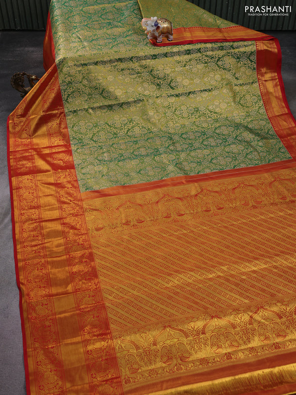 Kanchipuram tissue silk saree green and red with allover zari woven brocade weaves and long zari woven border