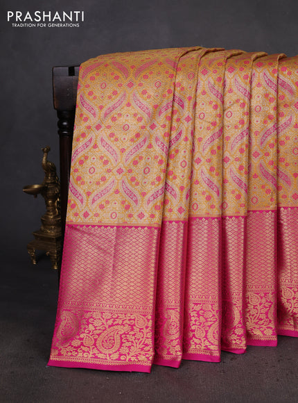 Kanchipuram tissue silk saree mustard yellow and pink with allover zari woven brocade weaves and zari woven border