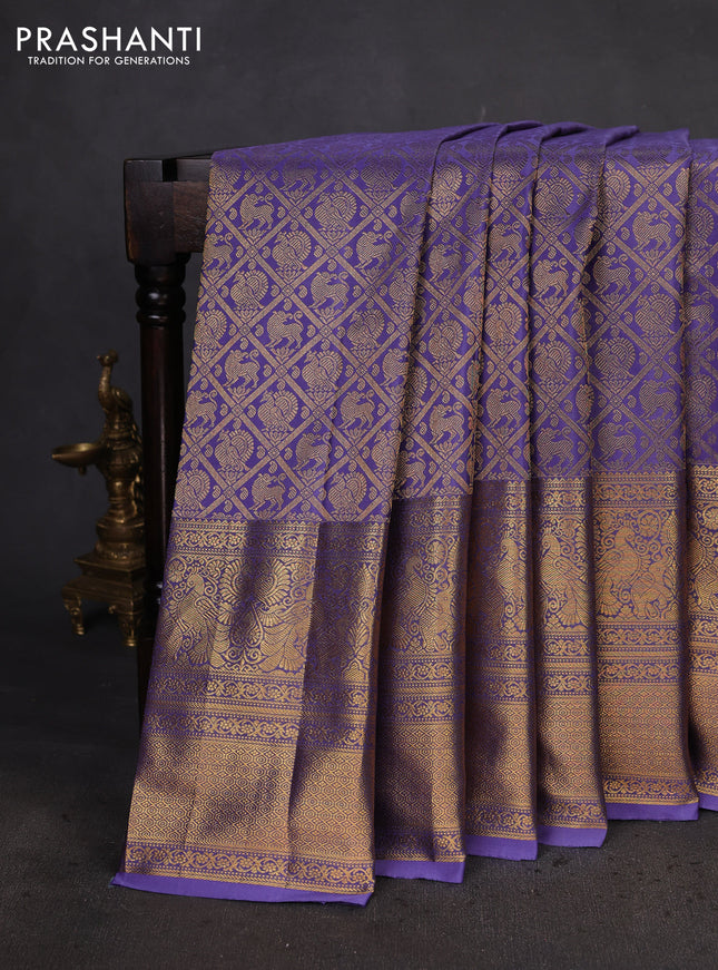 Kanchipuram silk saree lavender with allover zari woven brocade weaves and long zari woven border