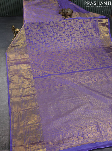 Kanchipuram silk saree lavender with allover zari woven brocade weaves and long zari woven border