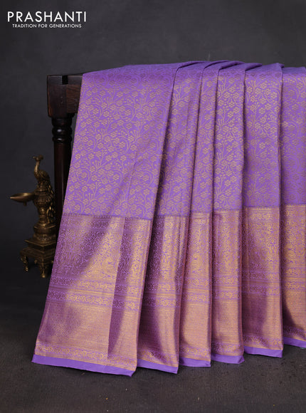 Kanchipuram silk saree lavender with allover zari woven brocade weaves and long zari woven border