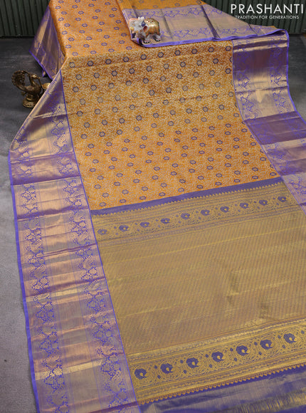 Kanchipuram tissue silk saree mustard yellow and lavender with allover zari woven brocade weaves and long zari woven border