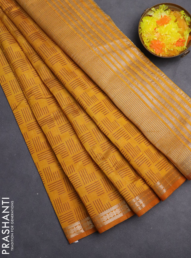 Semi raw silk saree mustard yellow with allover geometric weaves and zari woven border