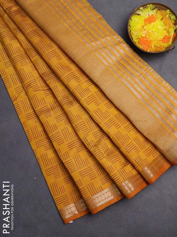 Semi raw silk saree mustard yellow with allover geometric weaves and zari woven border