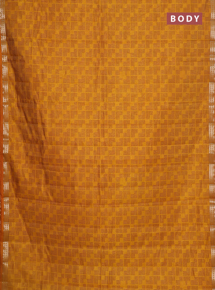 Semi raw silk saree mustard yellow with allover geometric weaves and zari woven border