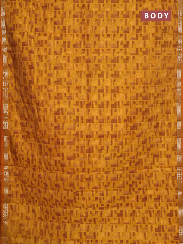 Semi raw silk saree mustard yellow with allover geometric weaves and zari woven border