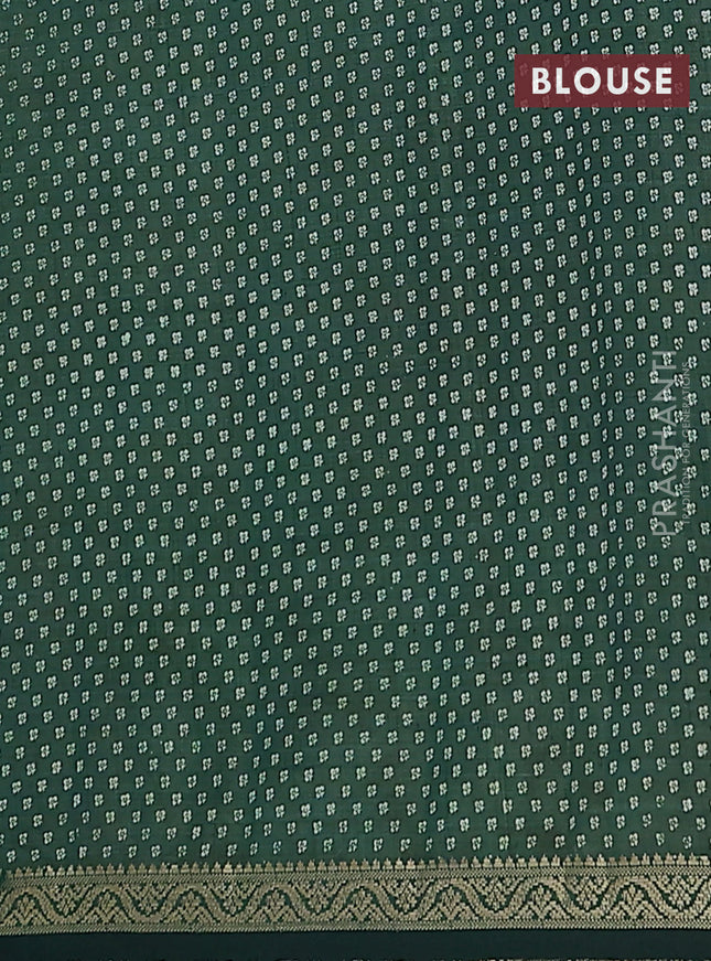 Semi raw silk saree bottle green with allover geometric weaves and zari woven border