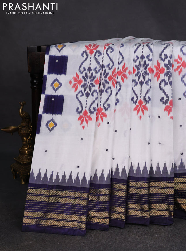 Pochampally silk saree off white and blue with allover ikat weaves and temple design zari woven border