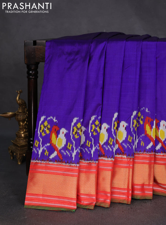 Pochampally silk saree blue and orange with plain body andlong ikat woven zari border