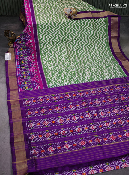 Pochampally silk saree green and purple with allover zig zag ikat weaves and long ikat woven zari border