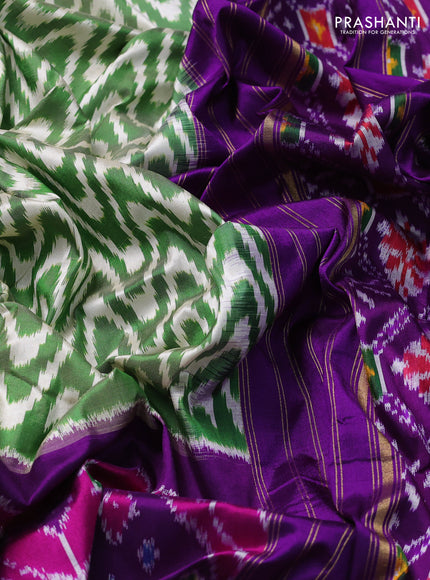 Pochampally silk saree green and purple with allover zig zag ikat weaves and long ikat woven zari border