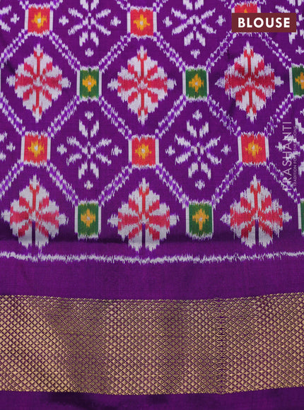 Pochampally silk saree green and purple with allover zig zag ikat weaves and long ikat woven zari border