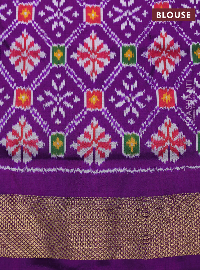 Pochampally silk saree green and purple with allover zig zag ikat weaves and long ikat woven zari border