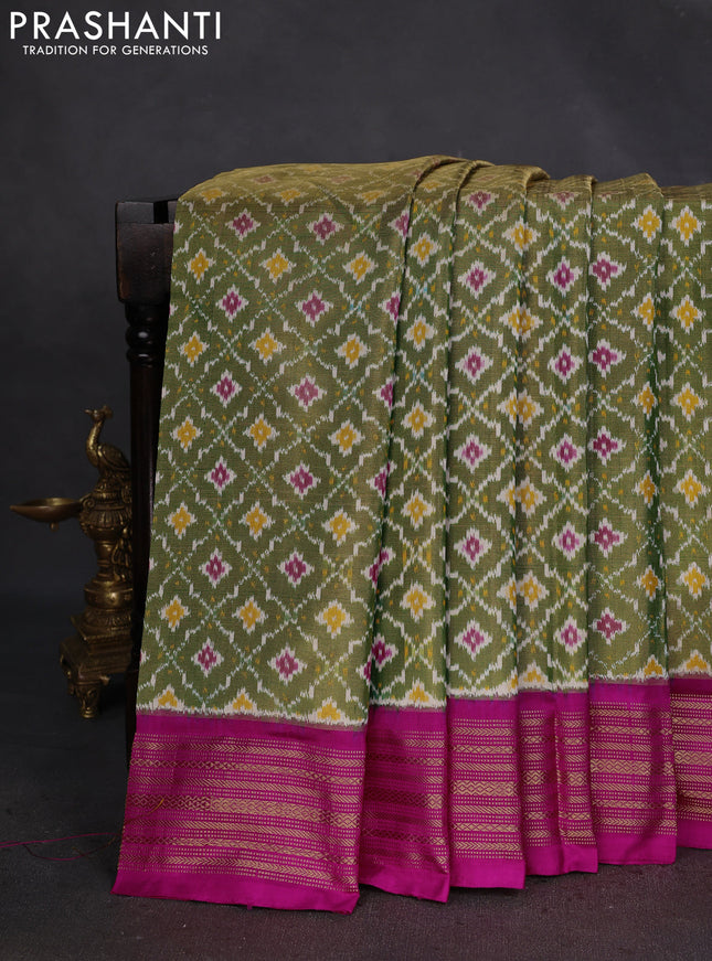 Pochampally tissue silk saree green and pink with allover ikat weaves and zari woven border