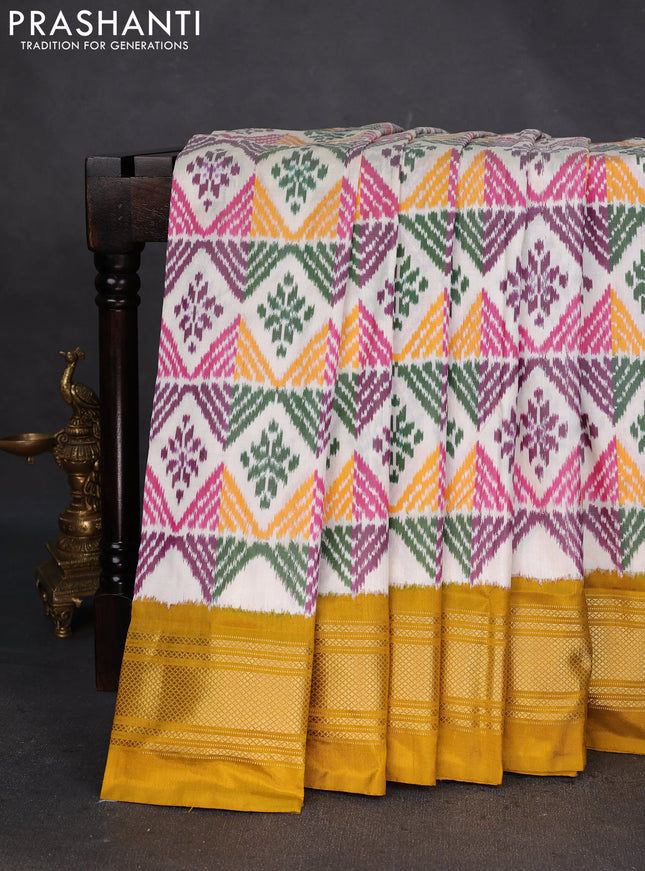 Pochampally silk saree cream and mustard yellow with allover ikat weaves and zari woven border