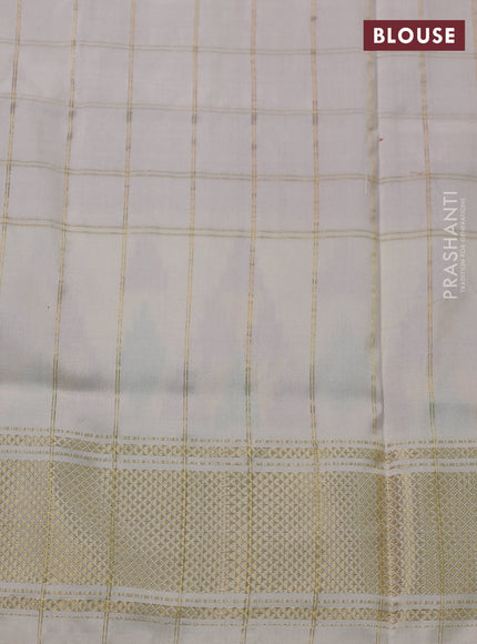 Pochampally silk saree pink and cream with allover zari checks & ikat weaves and ikat woven zari border