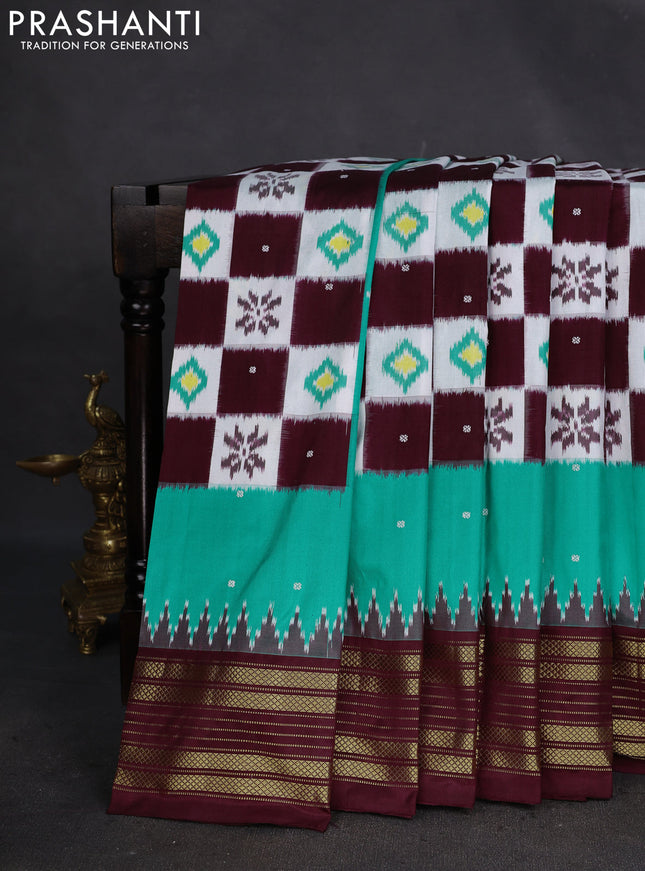 Pochampally silk saree teal green and deep maroon with allover ikat buttas & thread woven buttas and temple design zari woven border