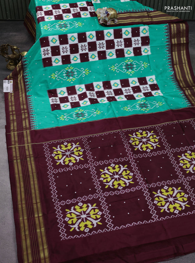 Pochampally silk saree teal green and deep maroon with allover ikat buttas & thread woven buttas and temple design zari woven border