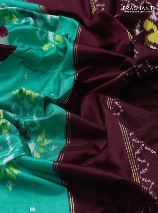 Pochampally silk saree teal green and deep maroon with allover ikat buttas & thread woven buttas and temple design zari woven border