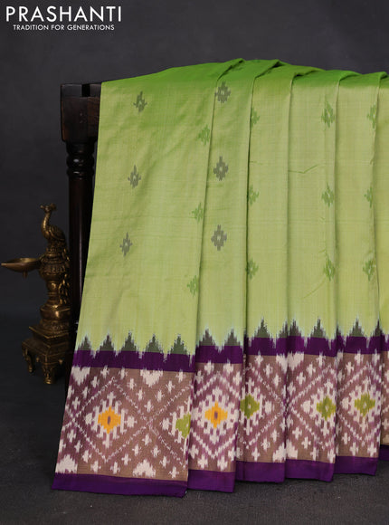 Pochampally silk saree pista green and violet with ikat butta weaves and ikat woven zari border