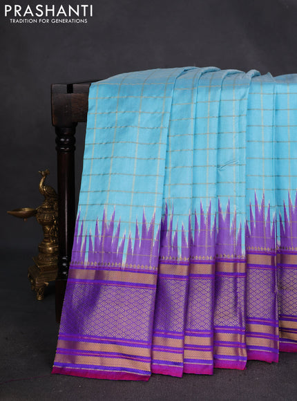 Pochampally silk saree light blue and violet with allover zari checks & ikat weaves and temple design zari woven border
