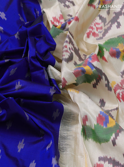 Pochampally silk saree blue and cream with allover ikat buttas and temple design zari woven ikat border