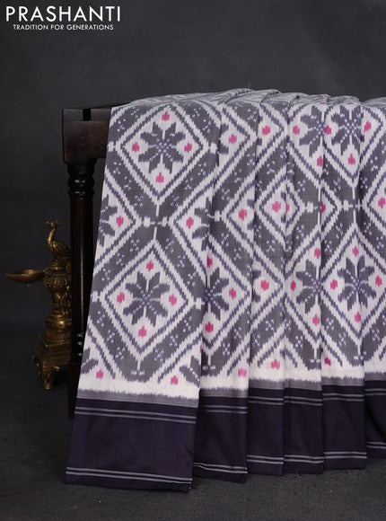 Pochampally silk saree off white and deep navy blue with allover ikat weaves and rettapet border