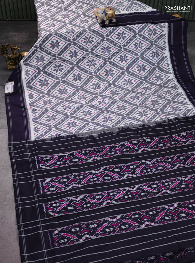 Pochampally silk saree off white and deep navy blue with allover ikat weaves and rettapet border