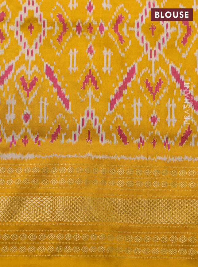 Pochampally silk saree bottle green and mustard yellow with plain body and long ikat woven zari border