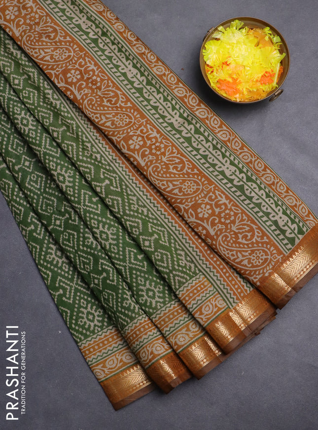 Maheshwari cotton saree green and dark mustard with allover ikat prints and zari woven border