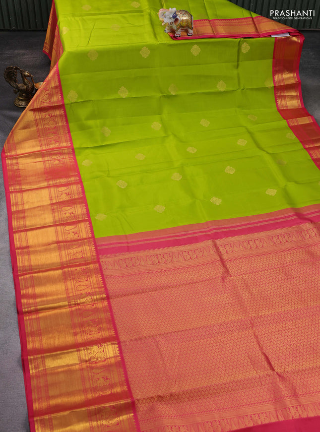 Pure kanchipuram silk saree light green and peach pink with zari woven buttas and long zari woven korvai border